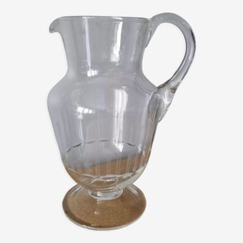 Antique pitcher in blown glass