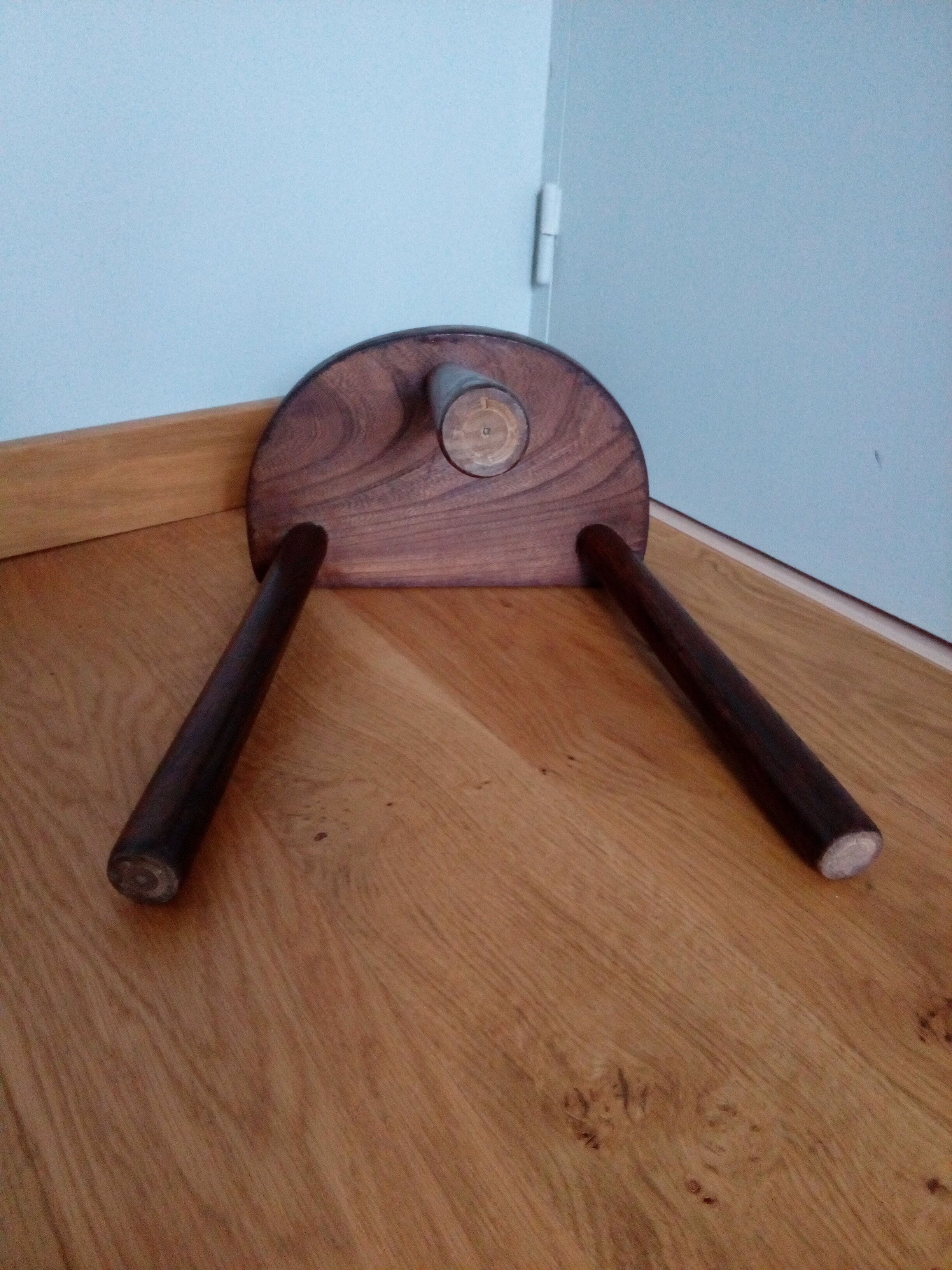 Tripod cowhide farm stool