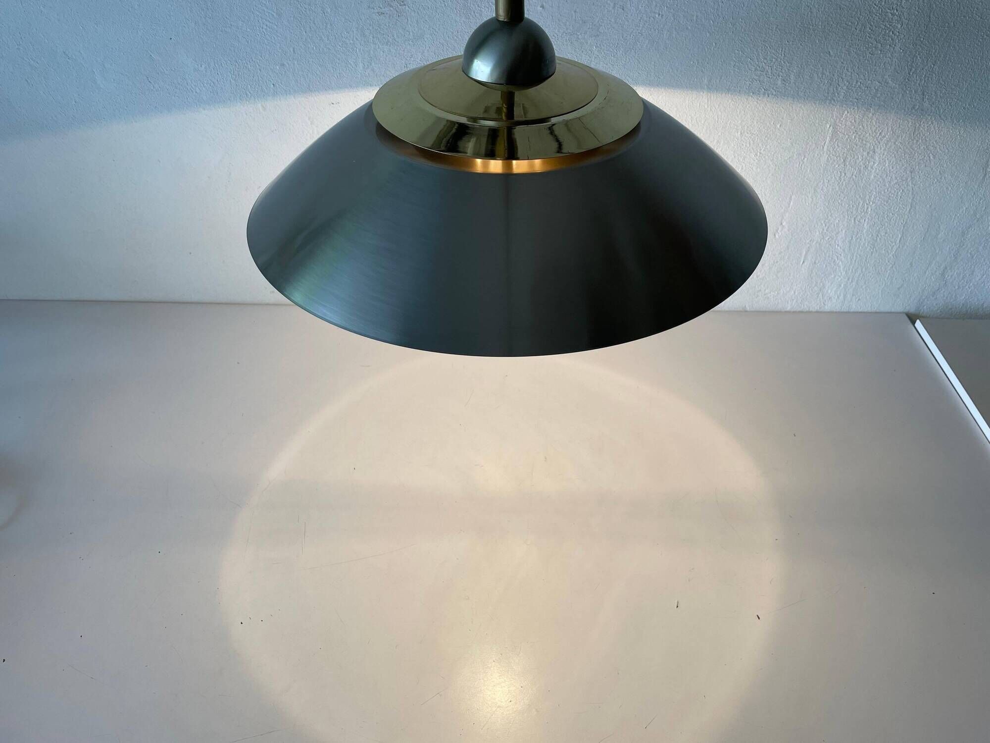 Suspended lamp in chrome and gold metal by TZ, 1970s, Germany.