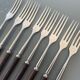 8 vintage teak forks