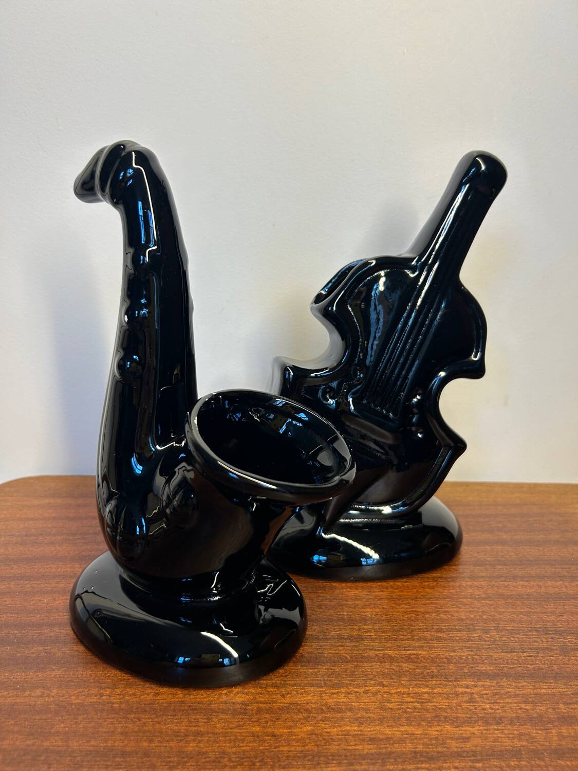 Black ceramic guitar and trumpet vases from the 60s