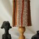 Vintage table lamp made of wood and knitted wool.