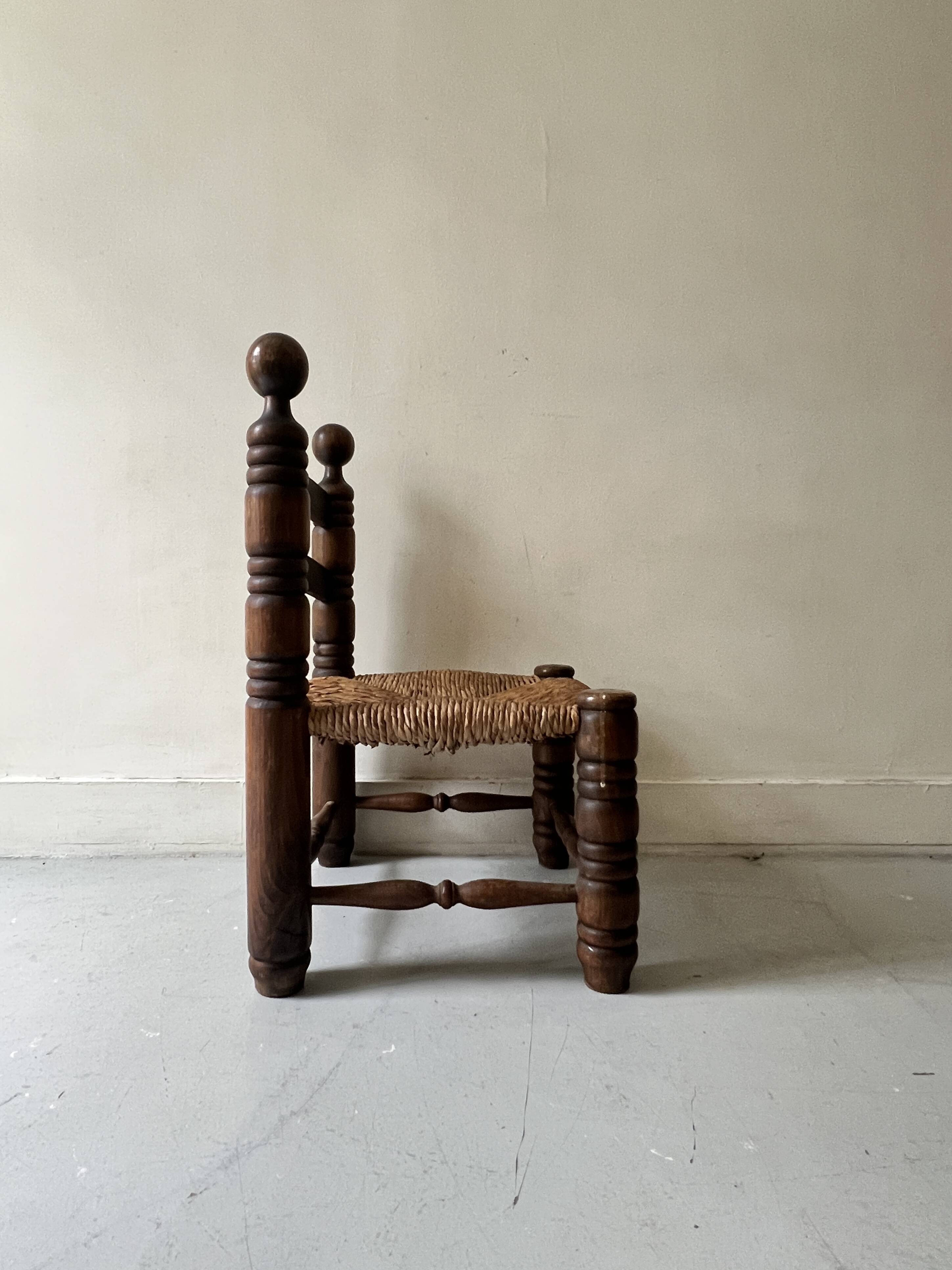 Vintage  chair in turned wood and straw, . 1950