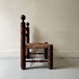 Vintage  chair in turned wood and straw, . 1950
