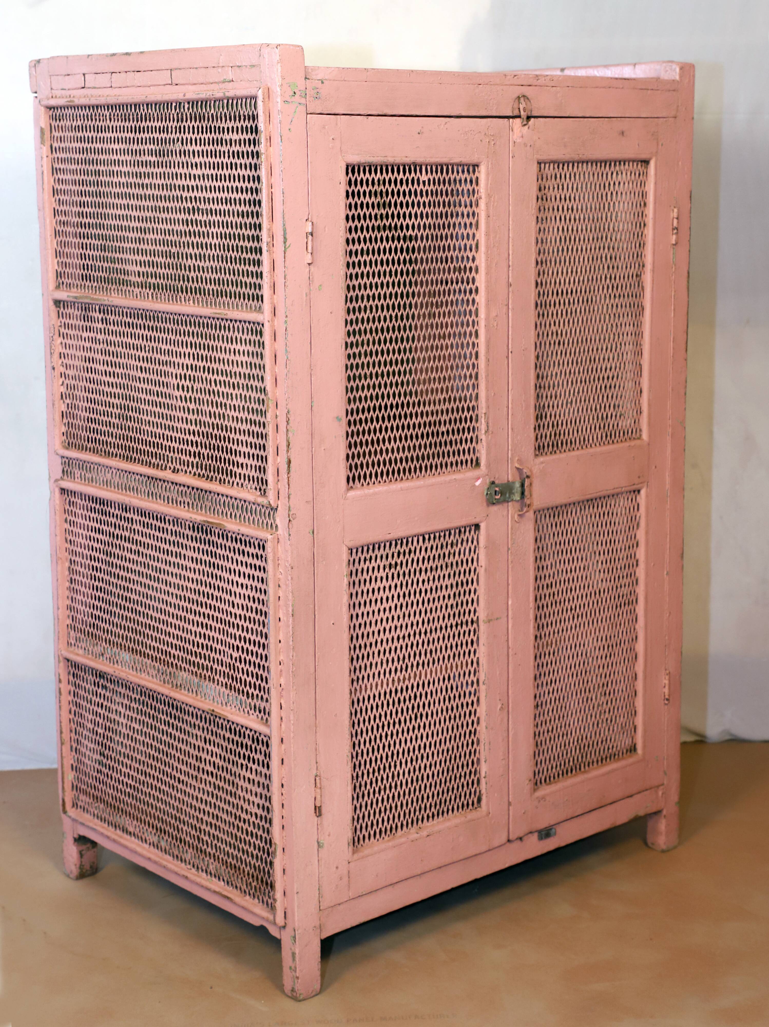 Ancient Burmese teak tribal pantry with original pink patina