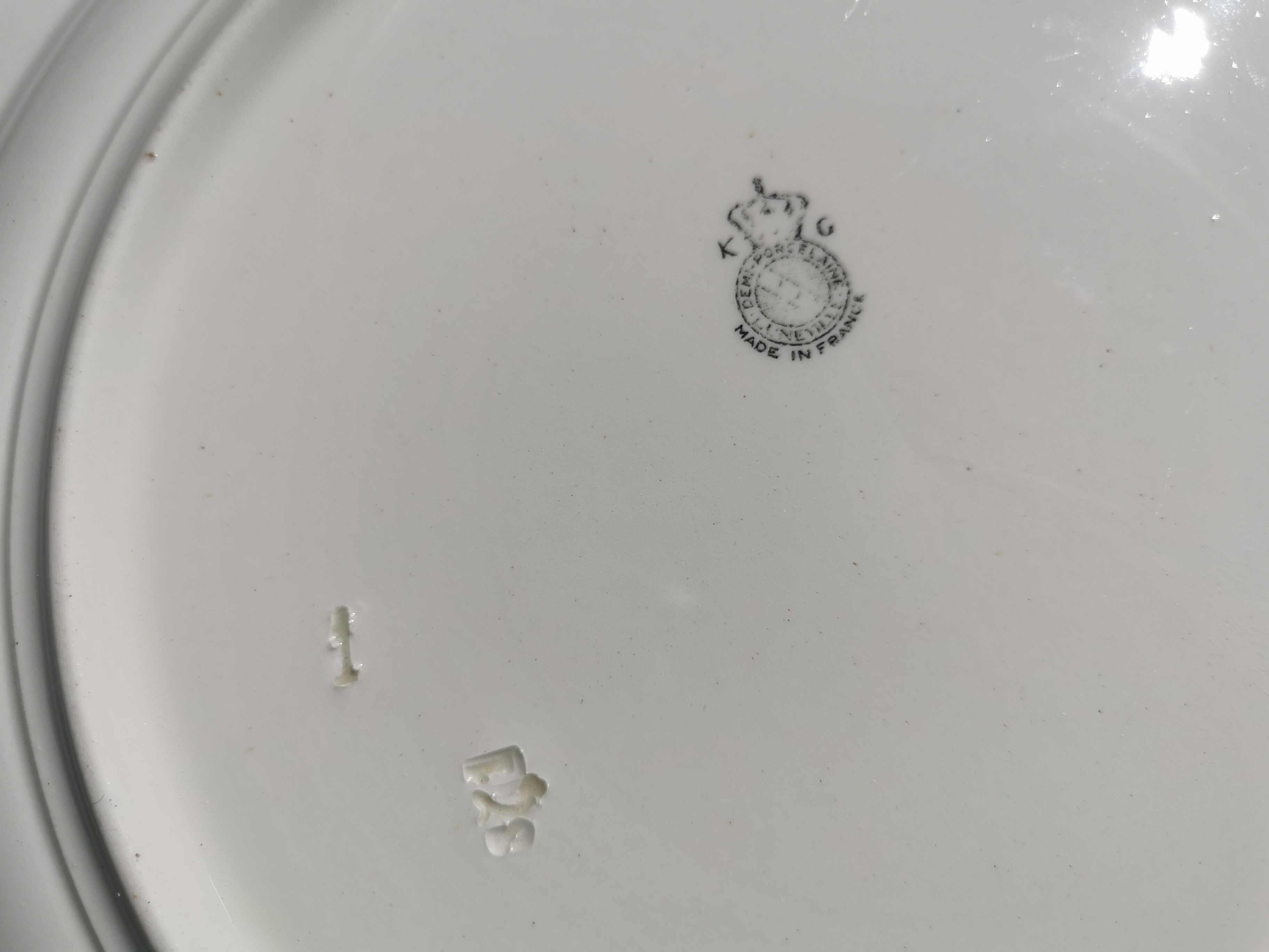 Half porcelain dish of Lunéville, Keller and Guérin, floral decoration.