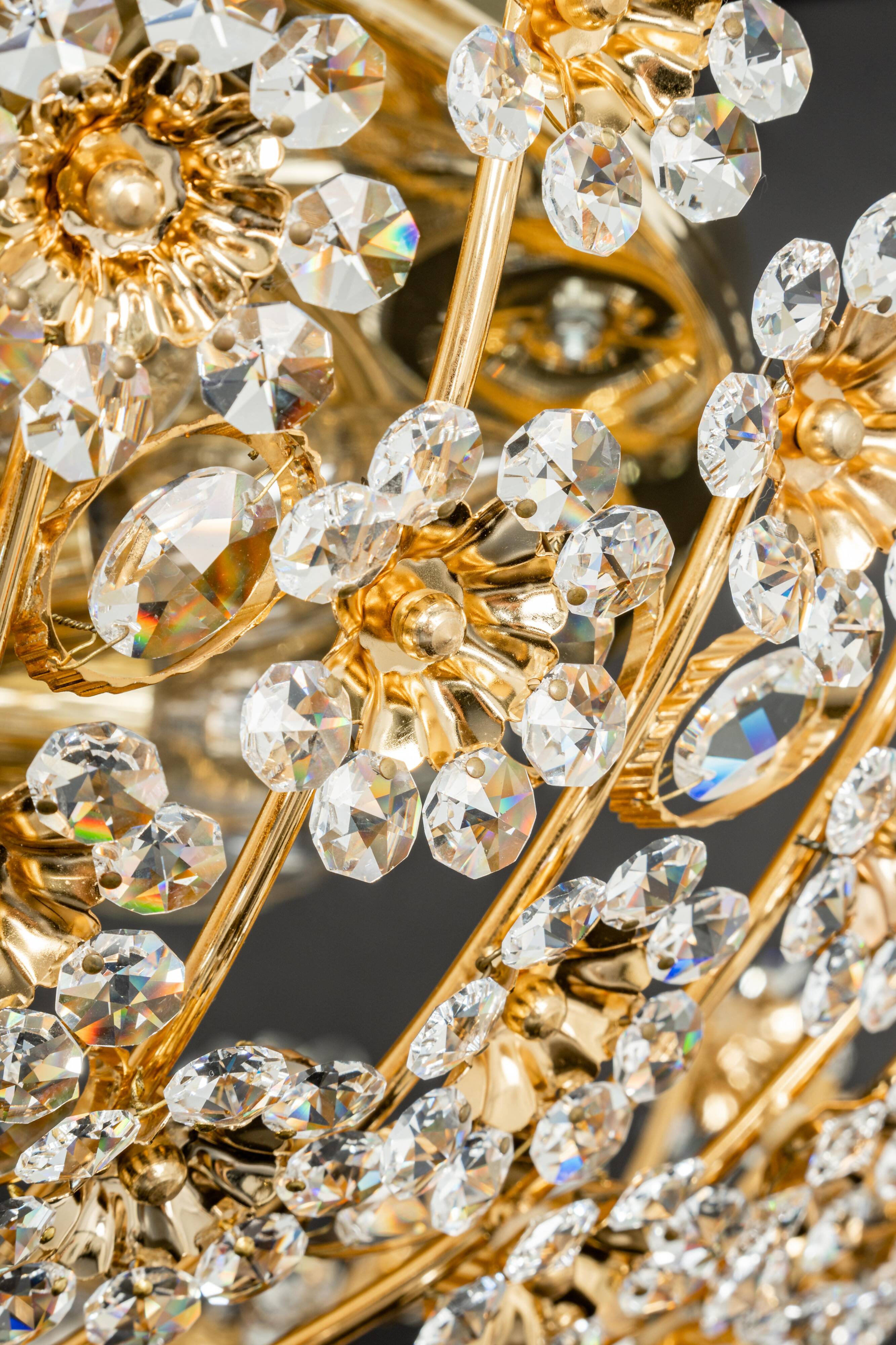 Small delicate ceiling light in gilded brass and cut glass in the shape of flowers by Palwa, Germany, 1970s.