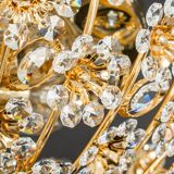 Small delicate ceiling light in gilded brass and cut glass in the shape of flowers by Palwa, Germany, 1970s.