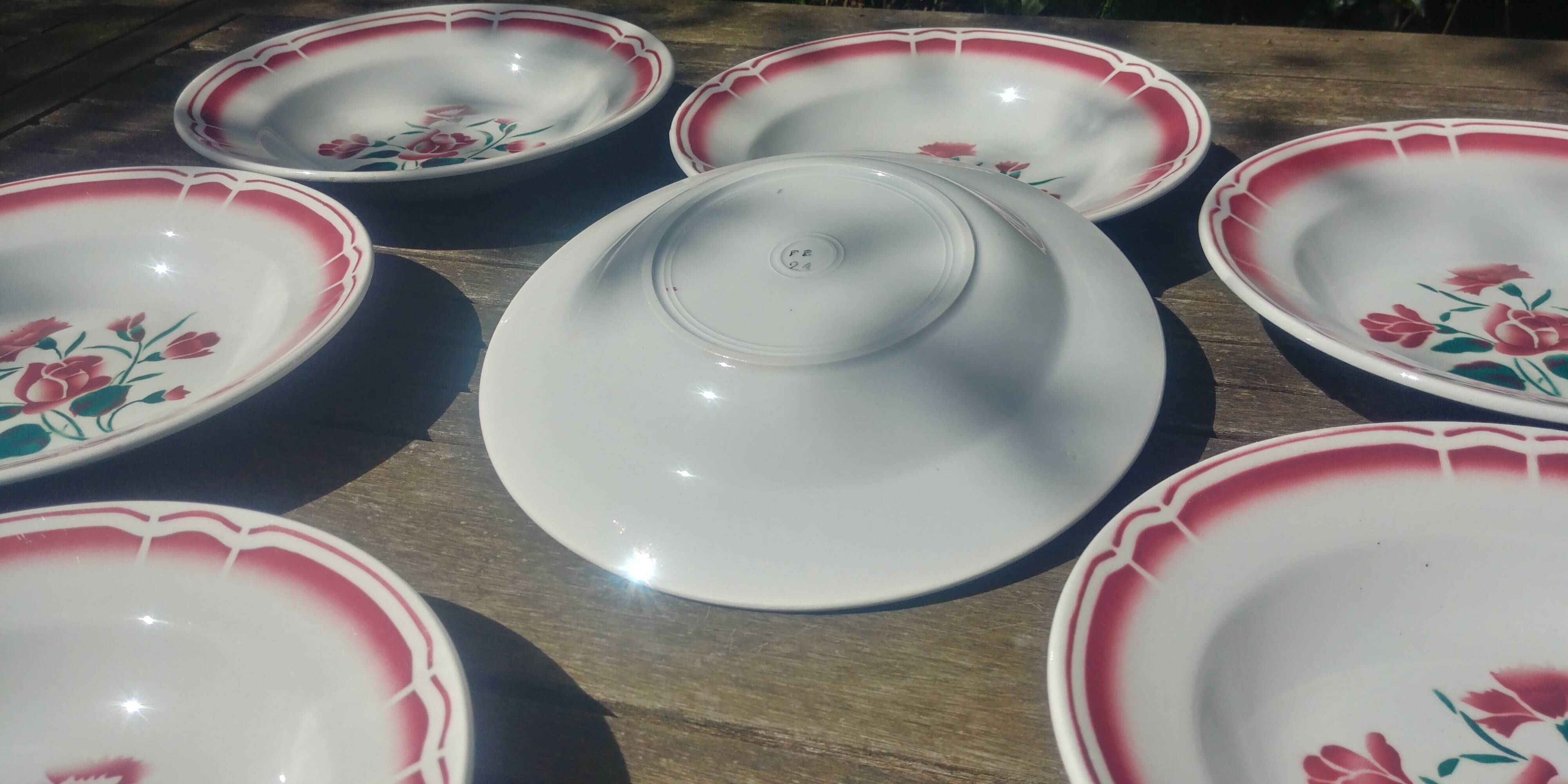 Lot of seven old soup plates from the 40s/50s decorated with roses