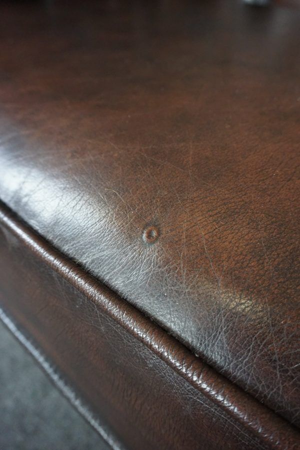 Chesterfield sofa in cowhide, 4 seats