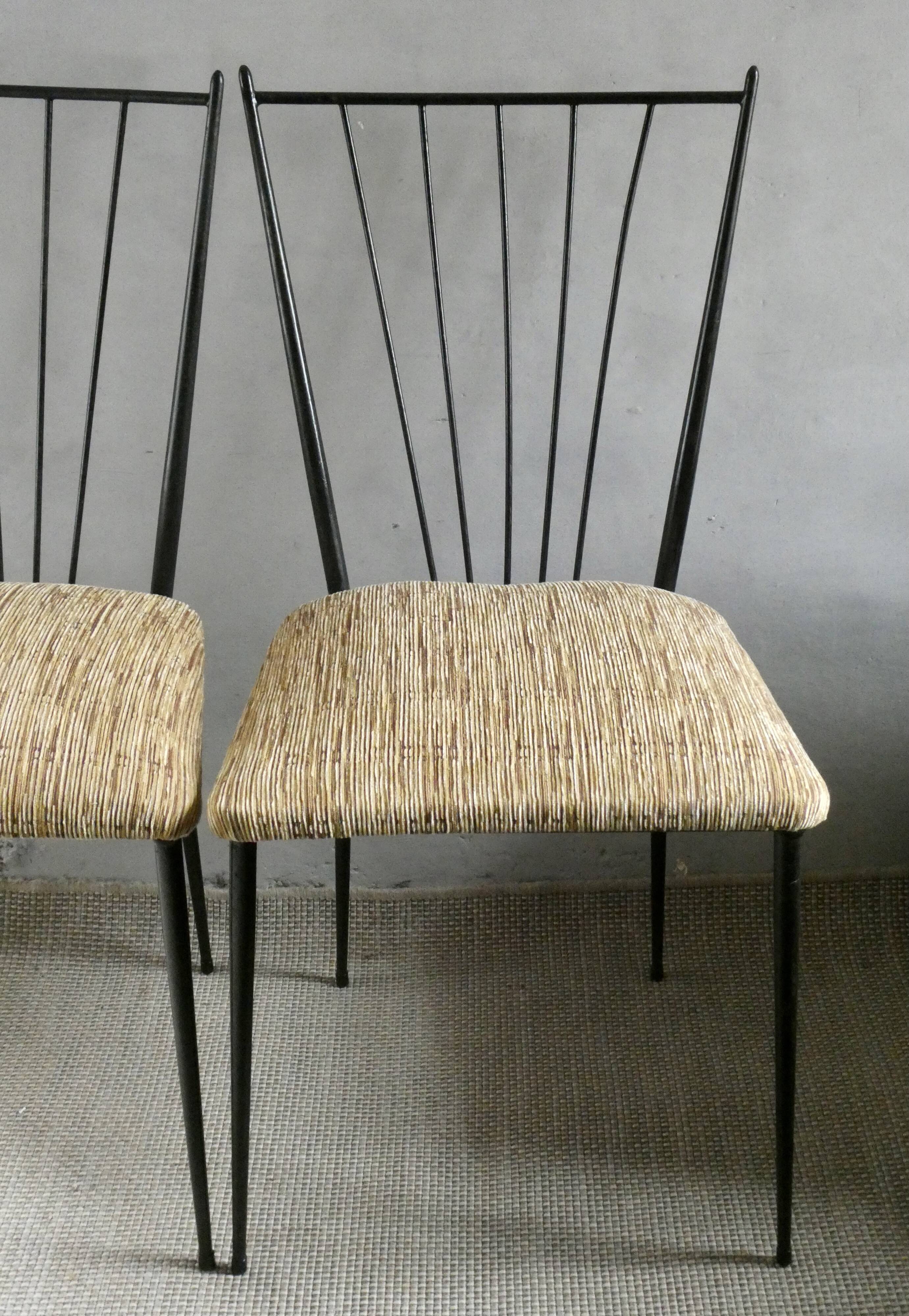 Pair of Colette Gueden chairs, black metal and fabric.