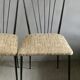 Pair of Colette Gueden chairs, black metal and fabric.