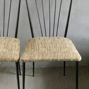 Pair of Colette Gueden chairs, black metal and fabric.