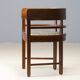 Central European armchair from the early 20th century with an inlaid backrest.