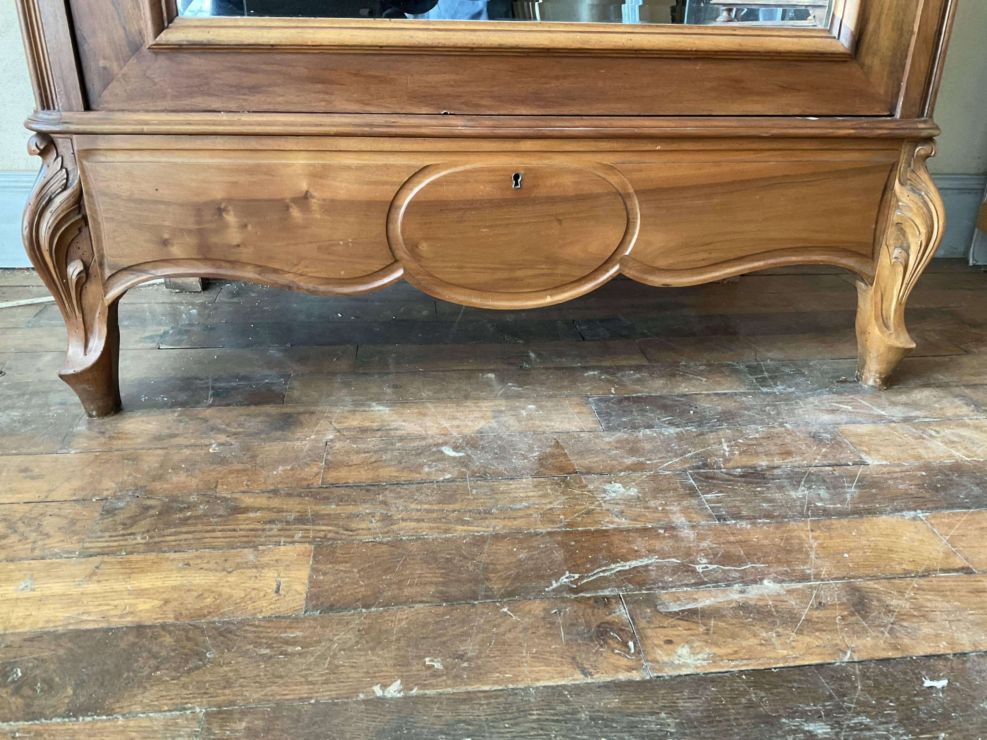 Antique Louis XV style mirrored wardrobe in solid walnut