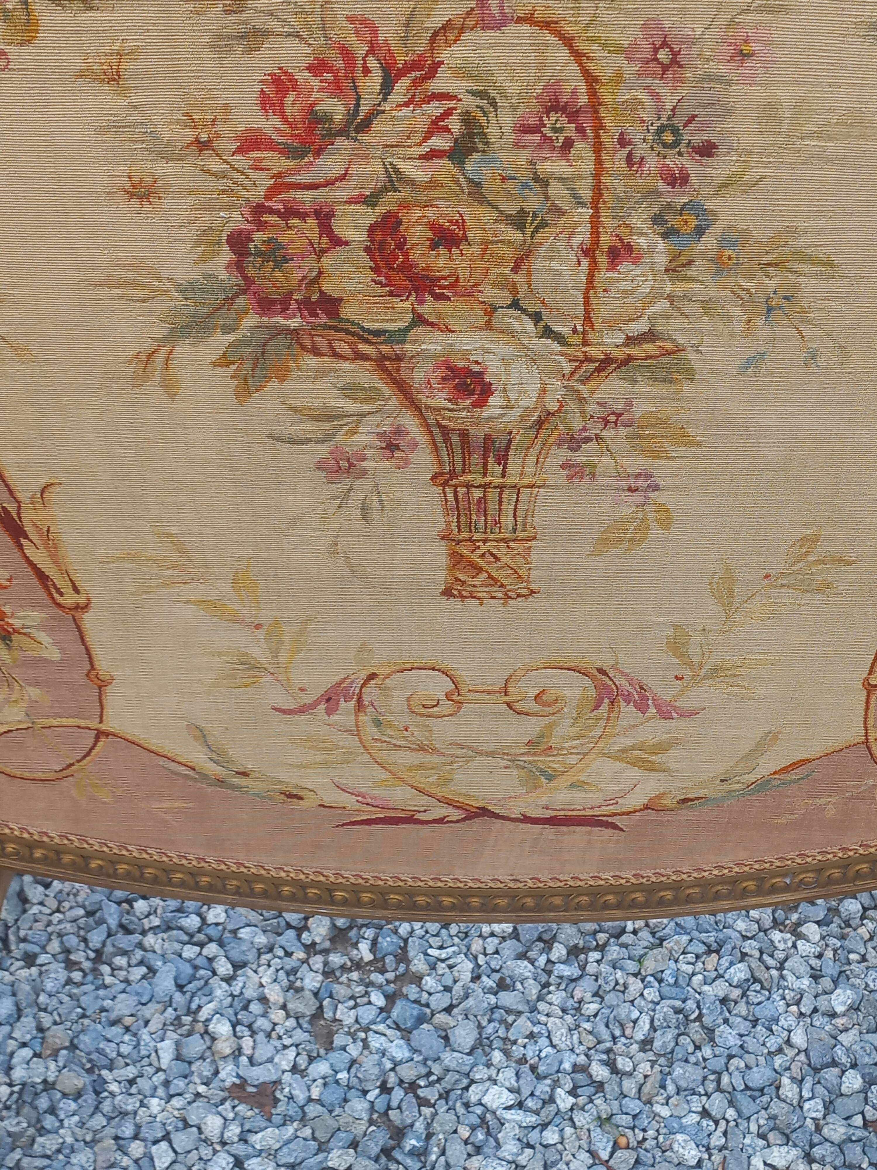 Golden wooden fireplace screen and Aubusson tapestry, 19th century.