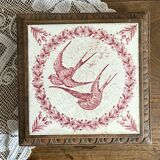 Ironstone trivet with birds