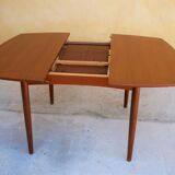 Scandinavian dining table extendable teak by Henry Walter Klein