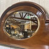 English mahogany shelf with its bevelled mirror from the early 20th century.
