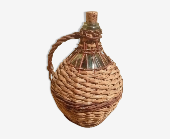 Dame jeanne recouverte d'osier, vintage