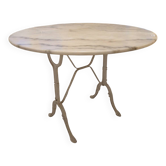 Table ronde en marbre et piètement en fonte