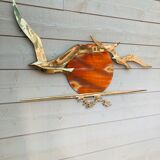 Bird brass and sun bronze wall decoration
