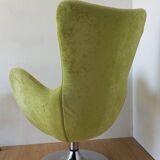 Bucket seat in chrome and green.