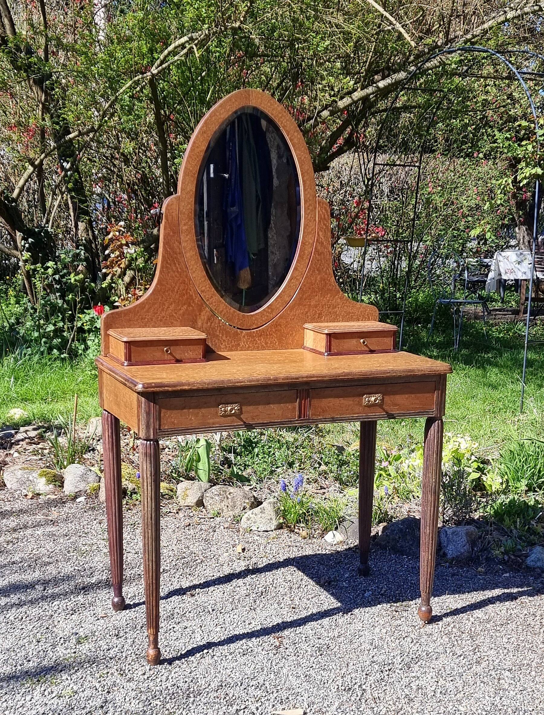Dresser from the early 19th century with a cheval mirror.