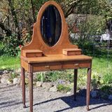 Dresser from the early 19th century with a cheval mirror.