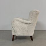 Danish lounge chair with new curly fur upholstery
