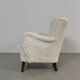 Danish lounge chair with new curly fur upholstery