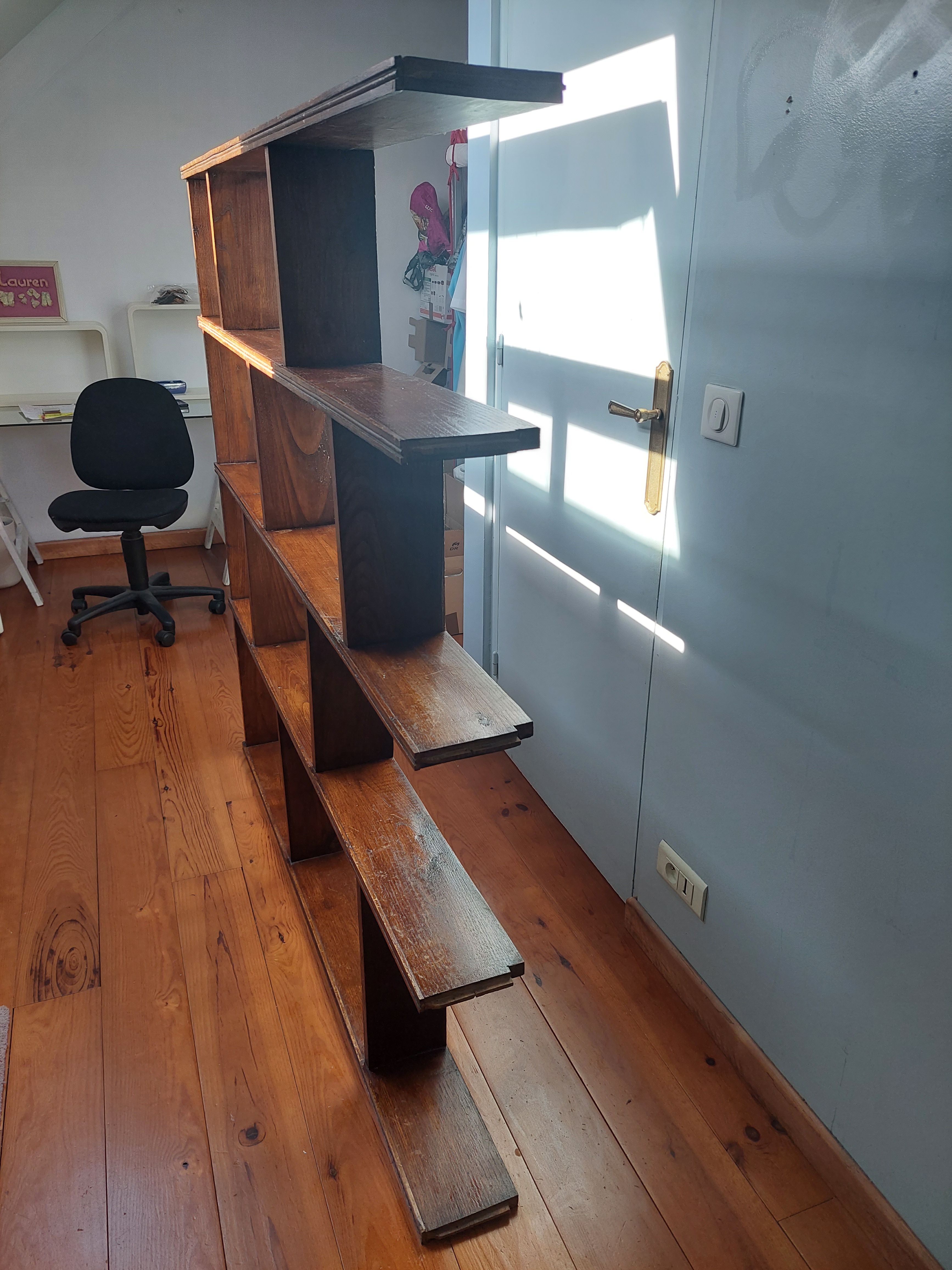 Asymmetrical wall or divider bookcase in dark wood