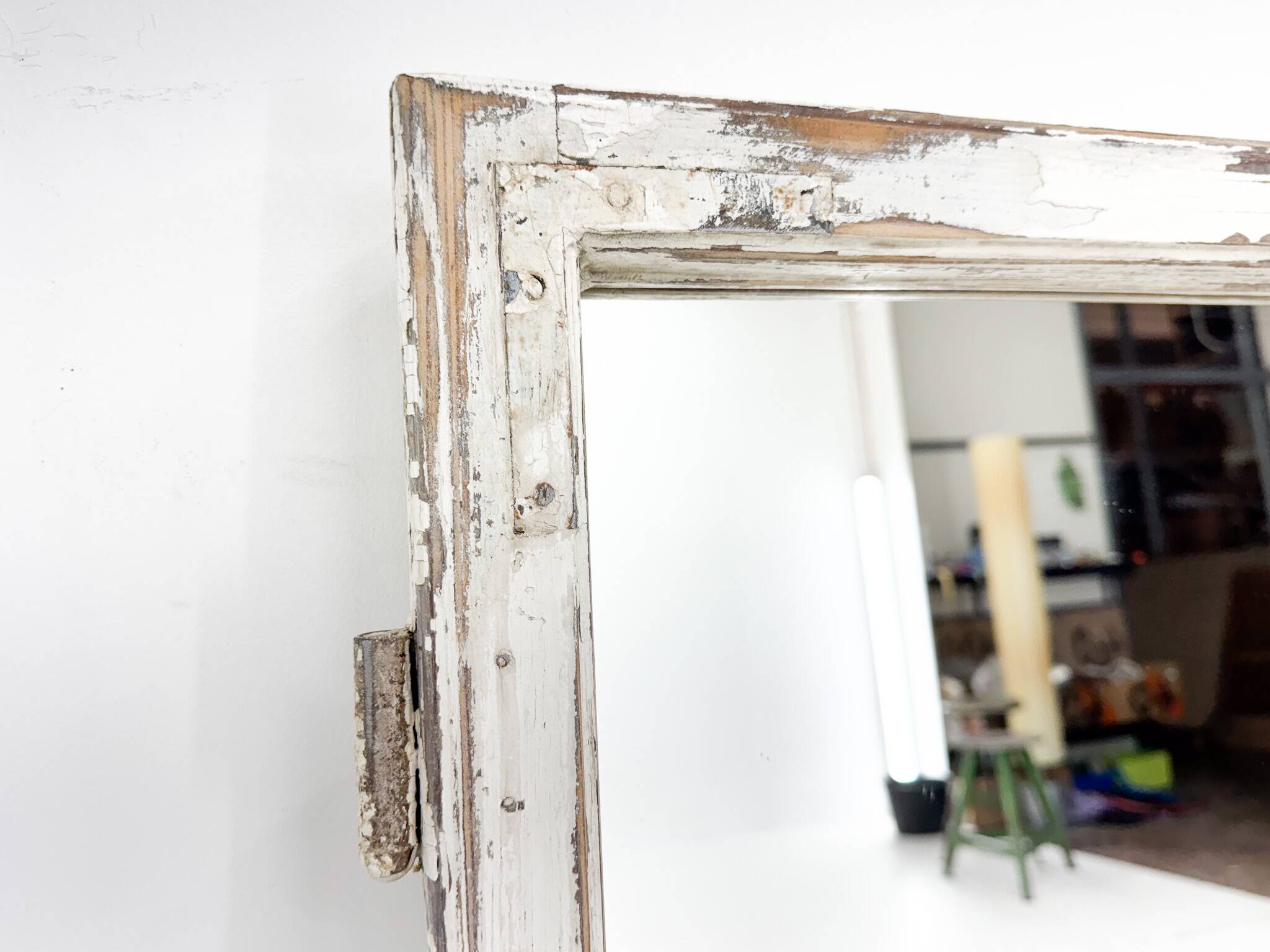 Vintage wooden window converted to a mirror