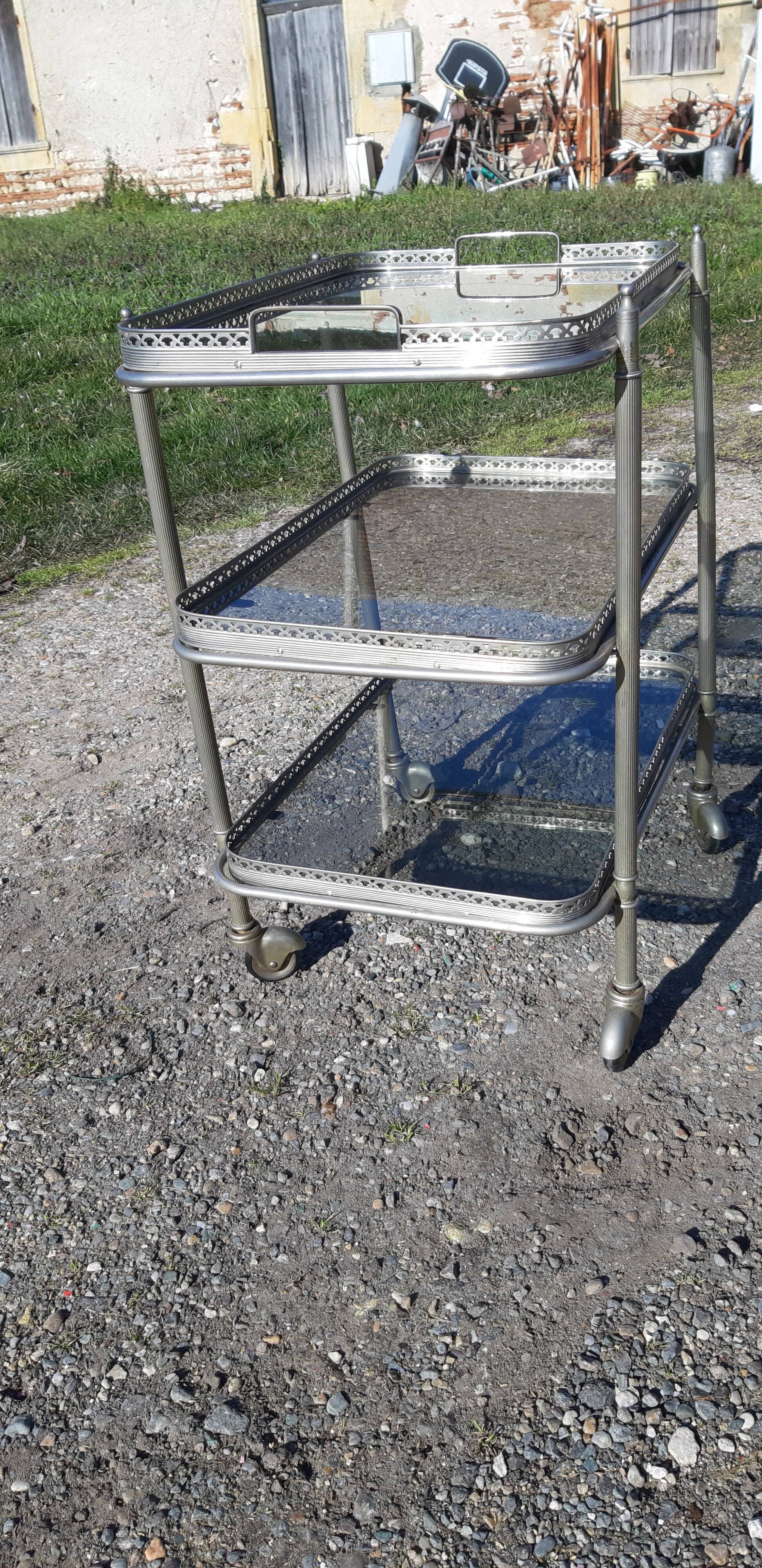 Rolling service silver metal and bluish glass