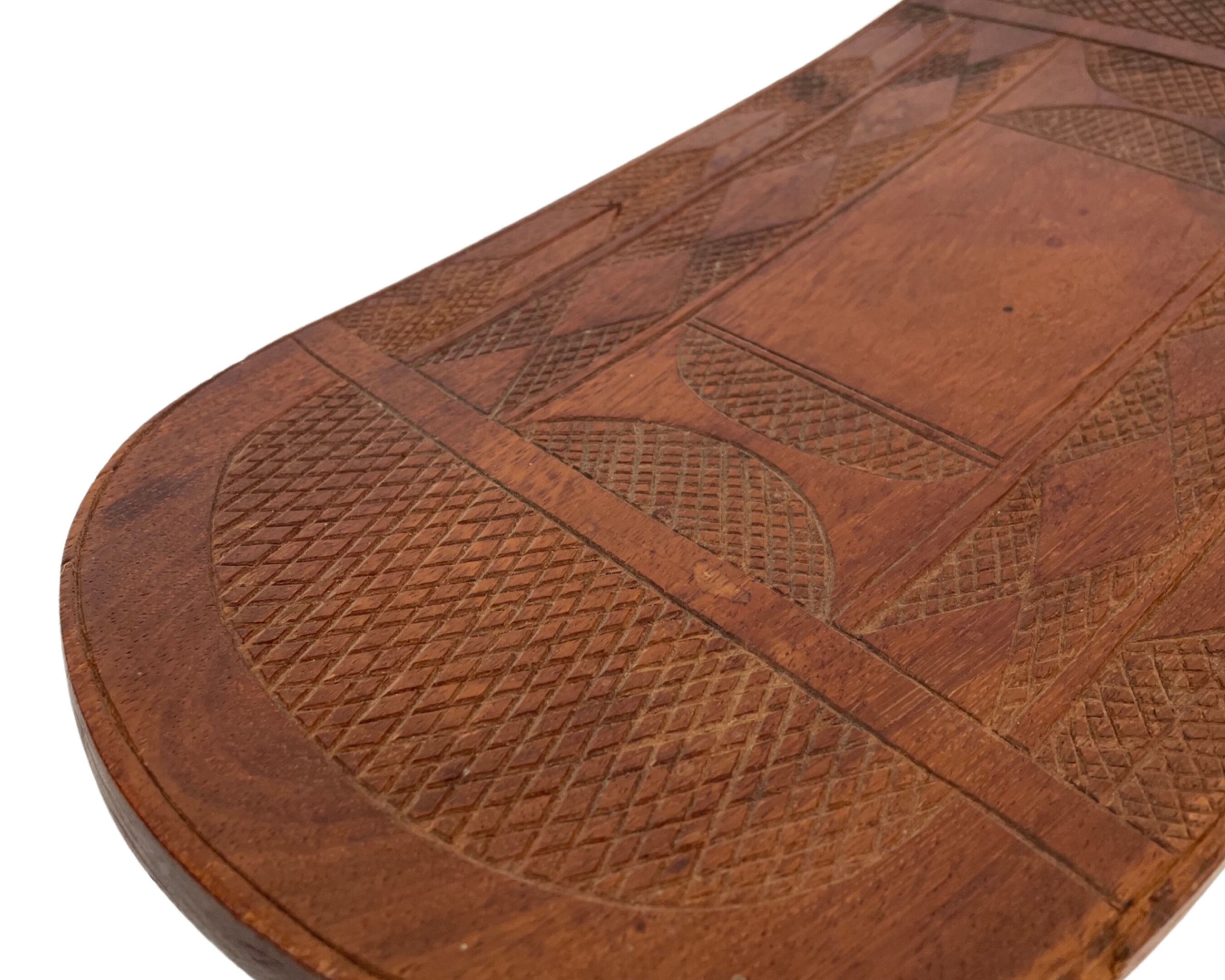 Vintage African hand-carved wooden Senufo stool bench design