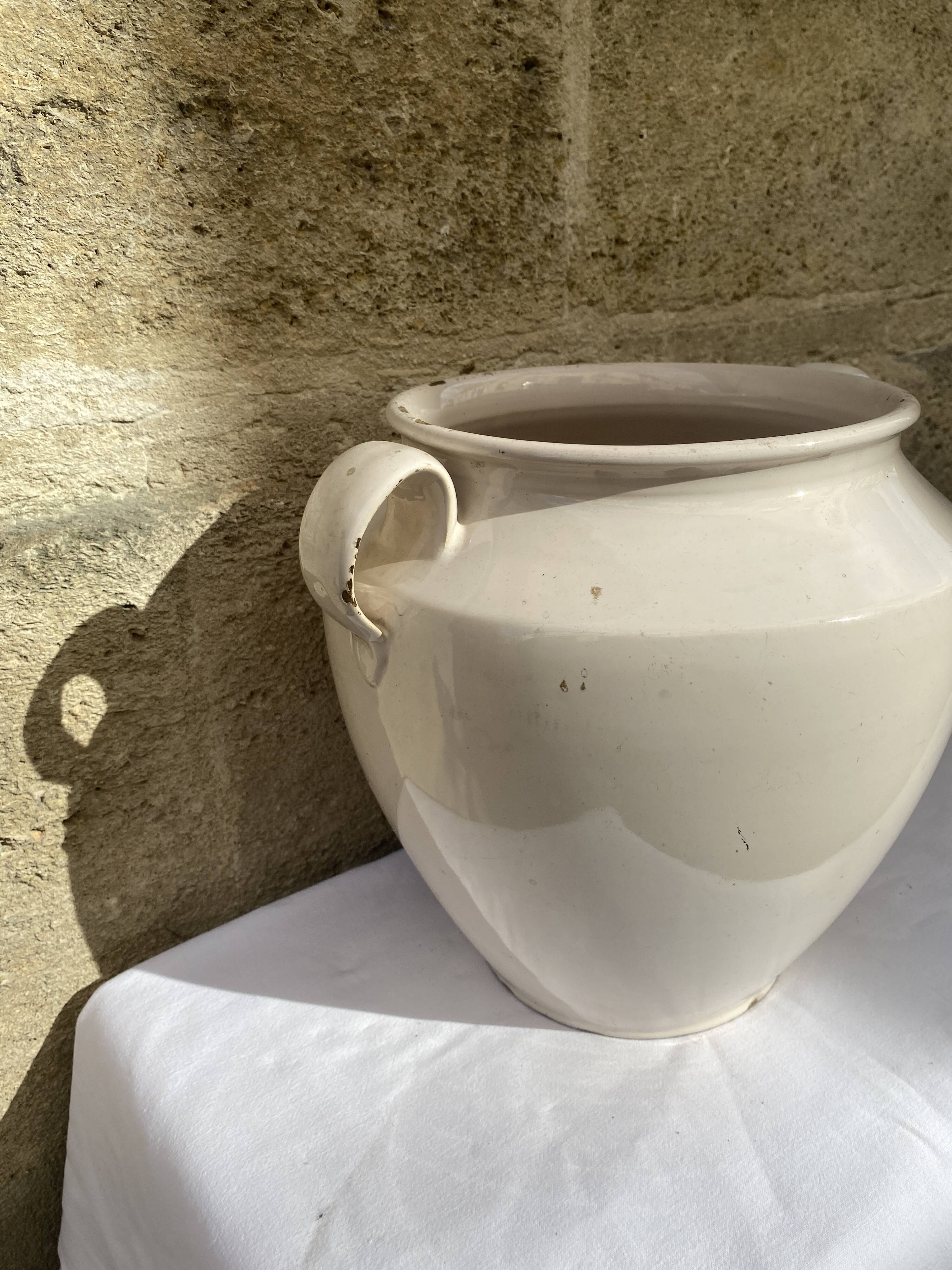 Enamelled terracotta pot