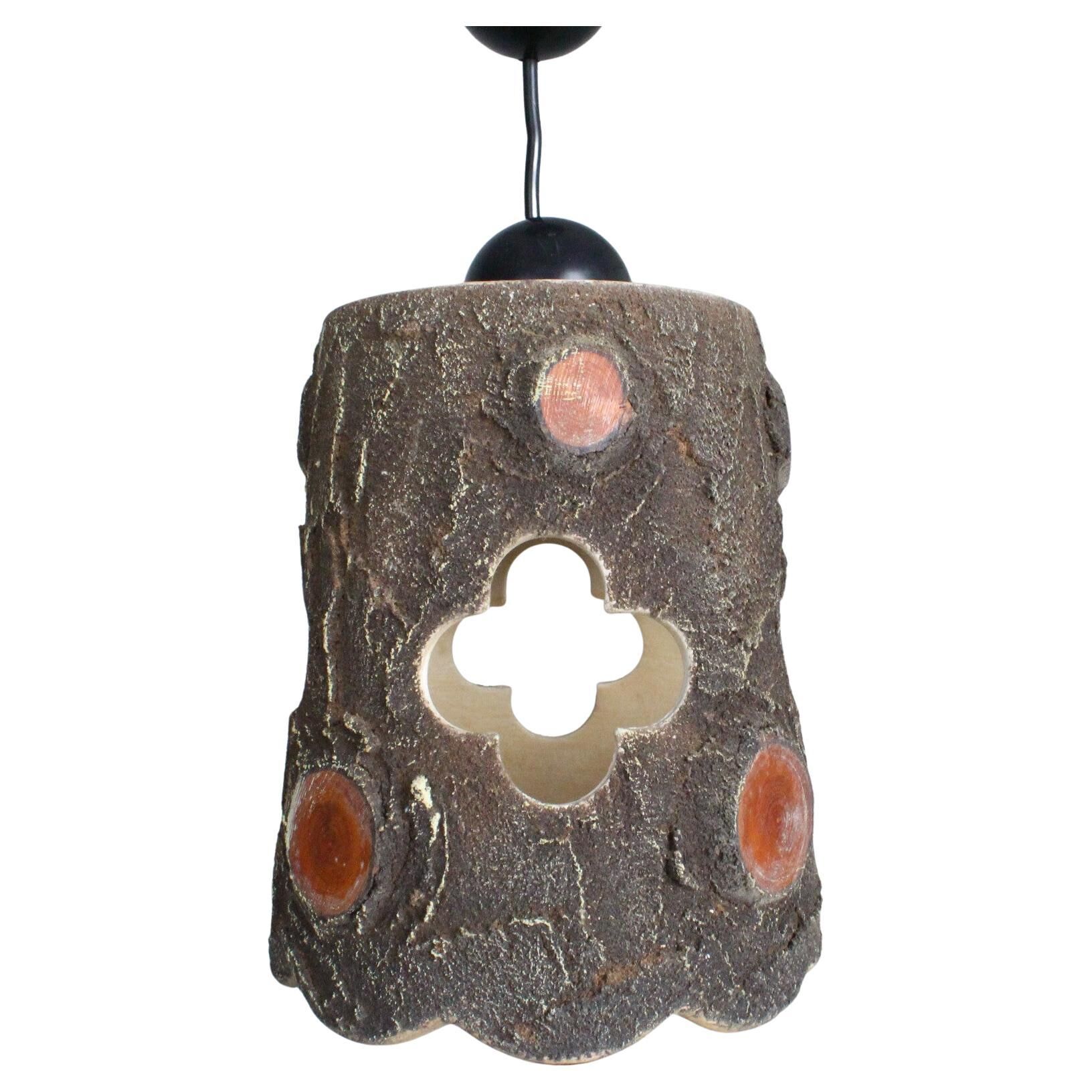 suspended lamp in brutalist ceramic France 1950