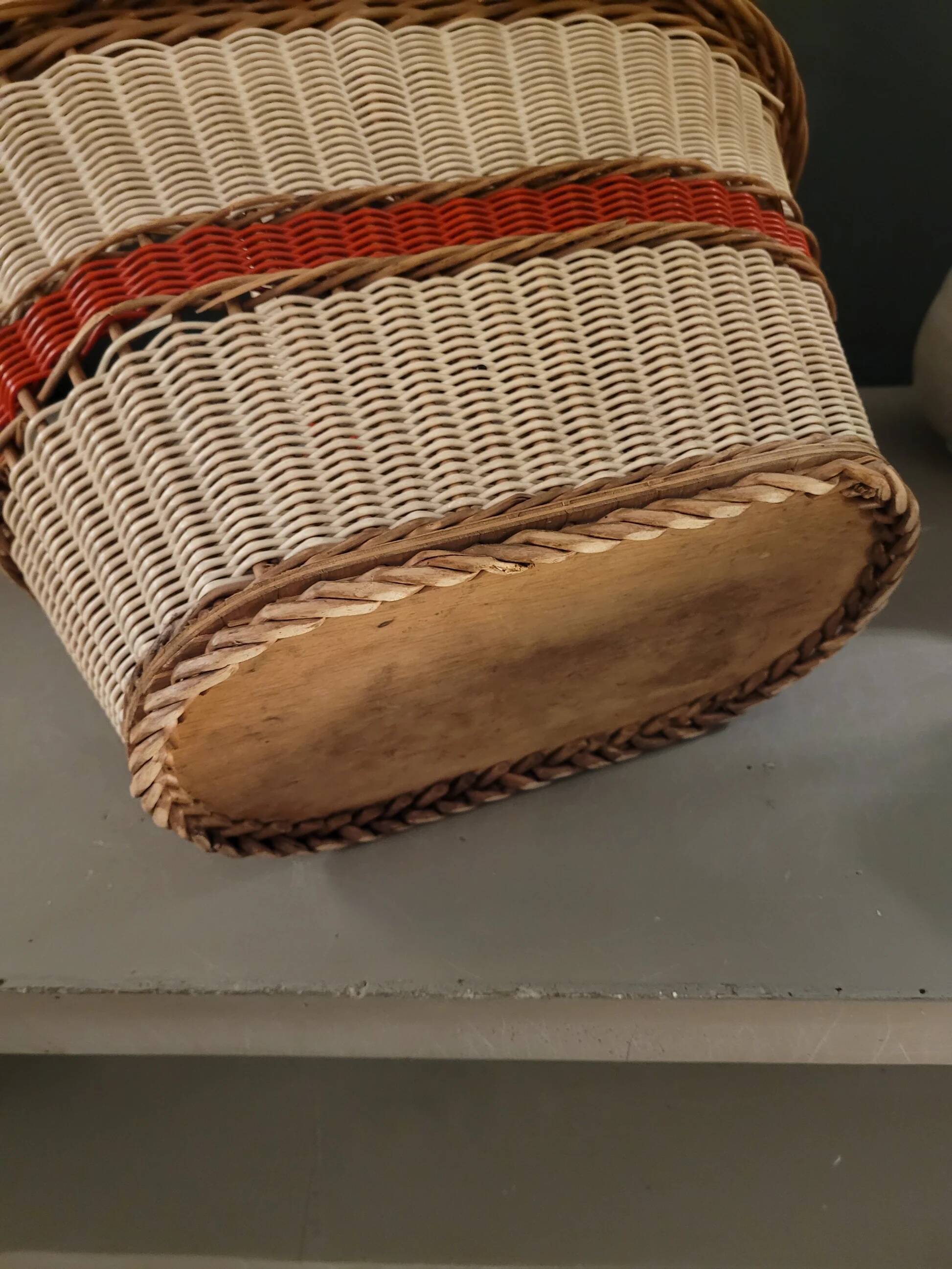 Old oval basket with a wooden base