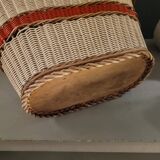 Old oval basket with a wooden base