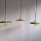 Trio of large industrial suspensions in green enamelled sheet metal.