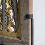 Rectangular Indonesian construction element with blue and yellow plant in carved wood