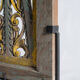 Rectangular Indonesian construction element with blue and yellow plant in carved wood