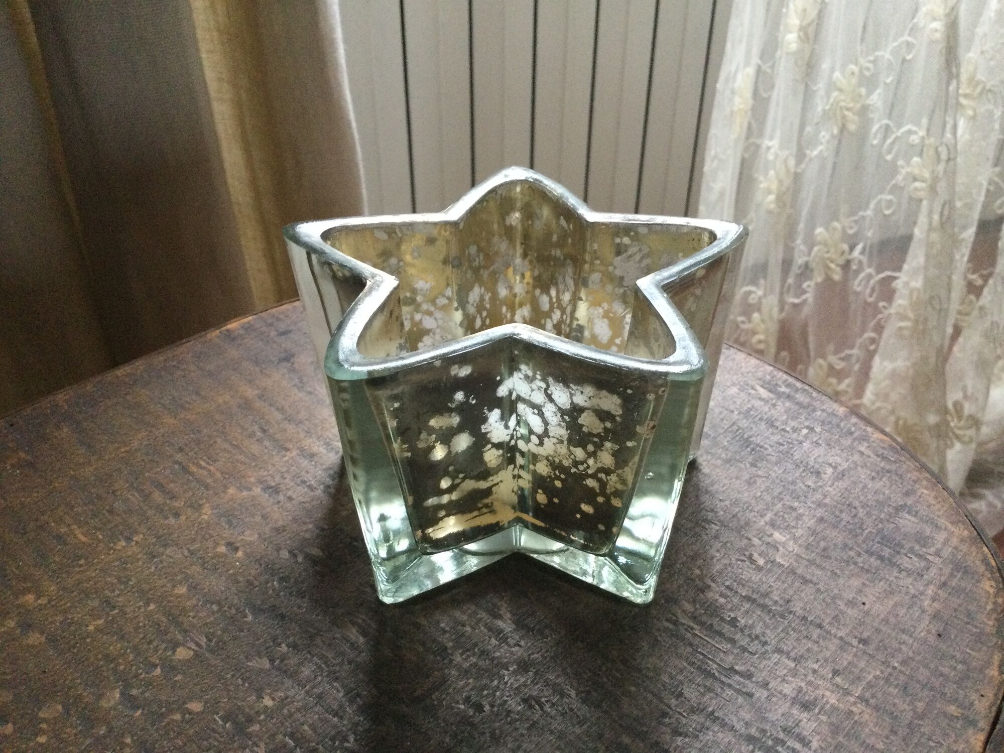 Pair of mercurized glass candle holders in the shape of stars