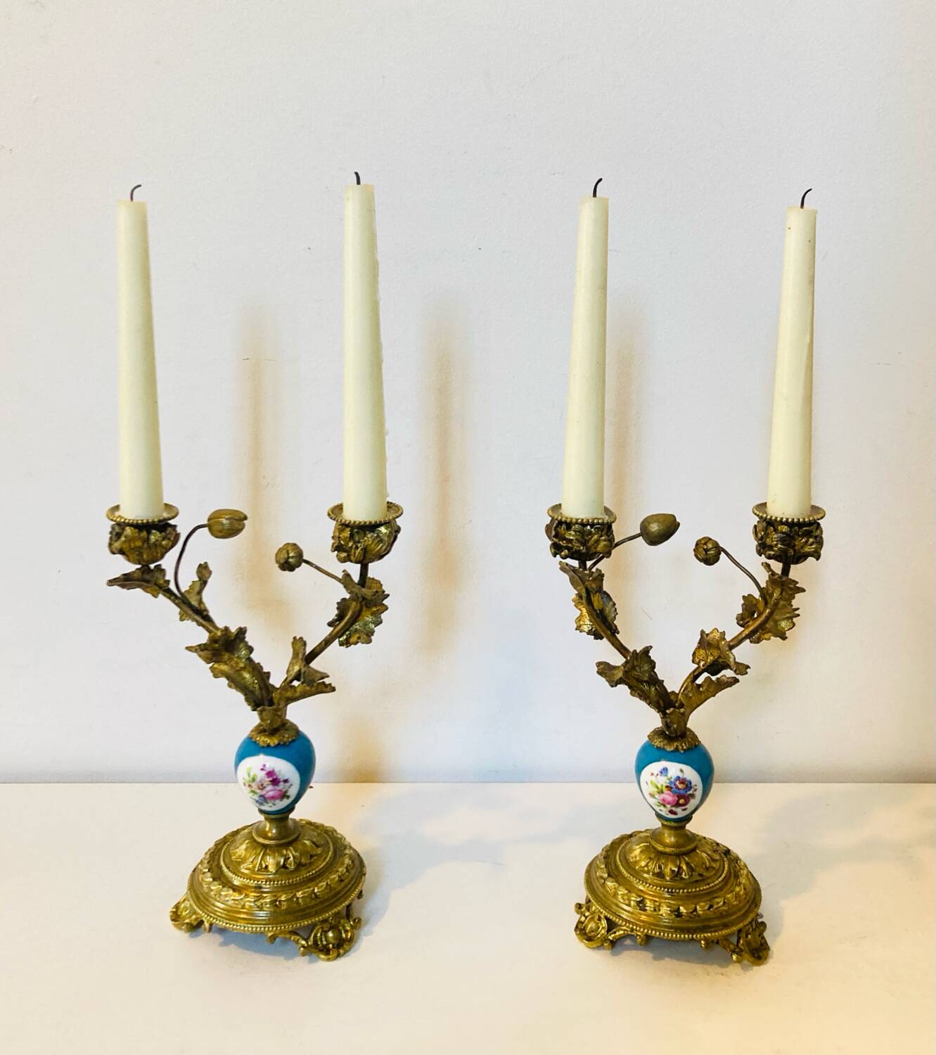 19th century candle holders in gilded bronze and porcelain
