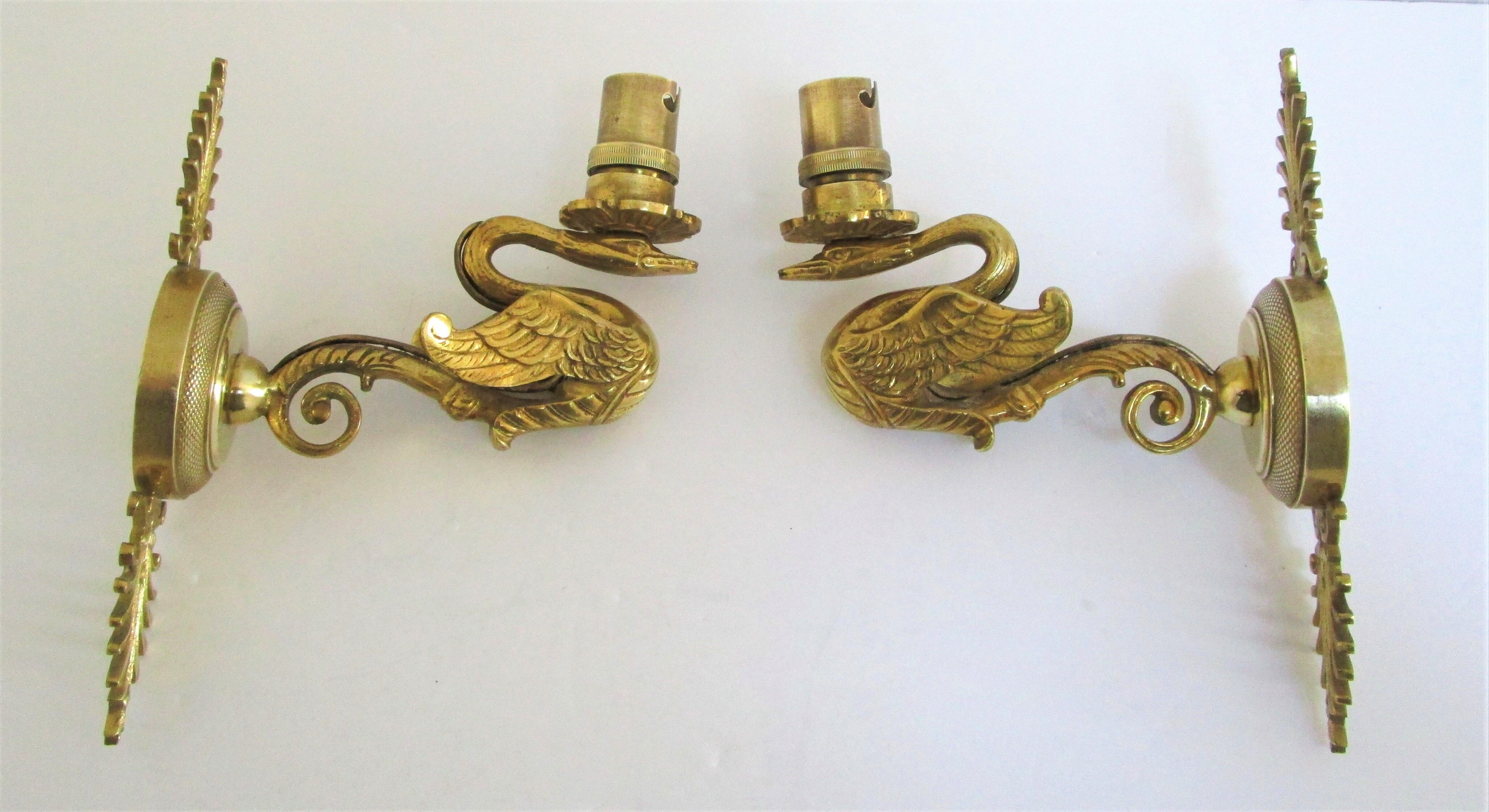 Pair of appliques swans gilded bronze patinated empire style