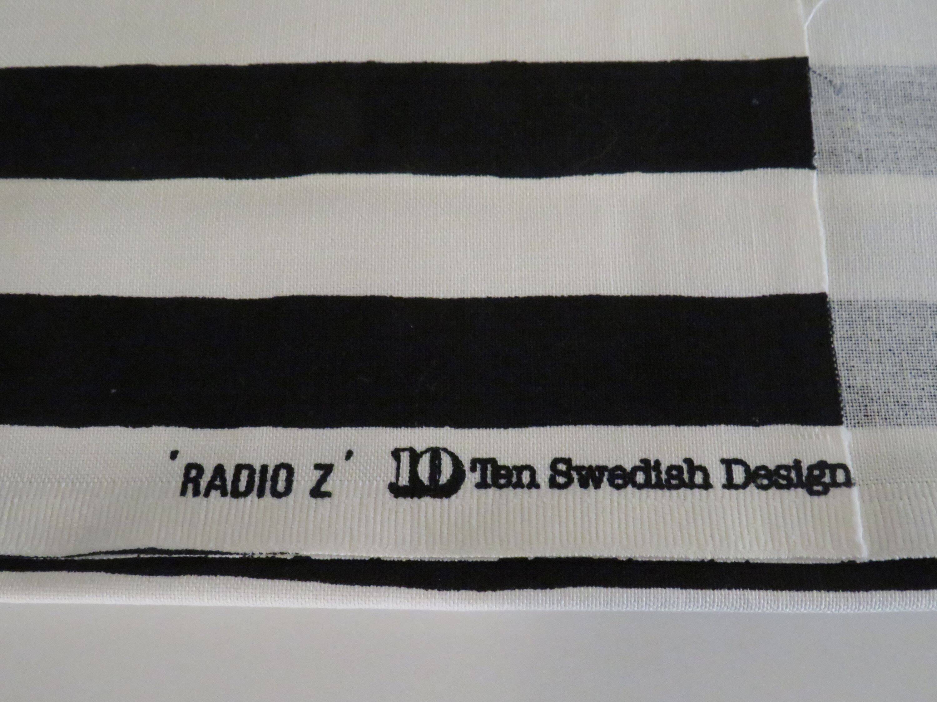 Vintage Ikea table lamp in white ceramic, Memphis style with black and white lampshade.