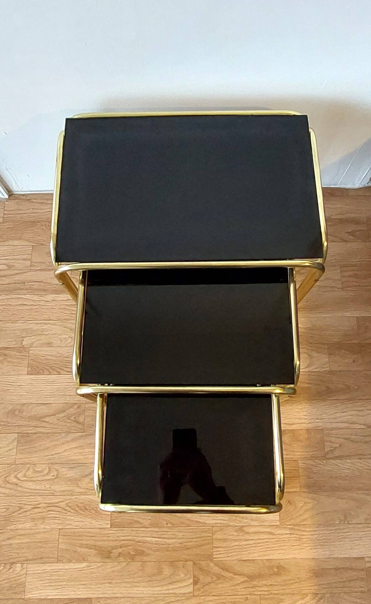 Vintage 1970 gold metal nesting tables.