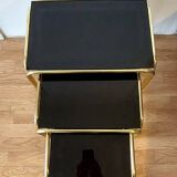 Vintage 1970 gold metal nesting tables.