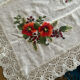 Linen tablecloth with embroidered flowers