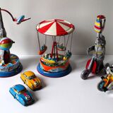 Vintage mechanical toys 'JW /Germany Western' 'Elephant on scooter'
